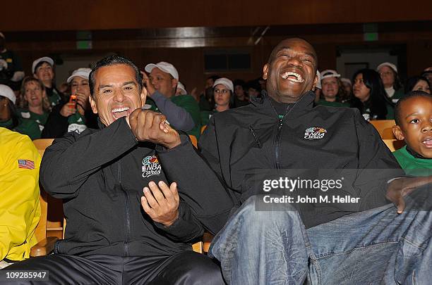 Los Angeles City Mayor Antonio Villiaraigosa and former NBA player Dikembe Mutombo attend the NBA Cares All-Star Day of Service with City Year at...