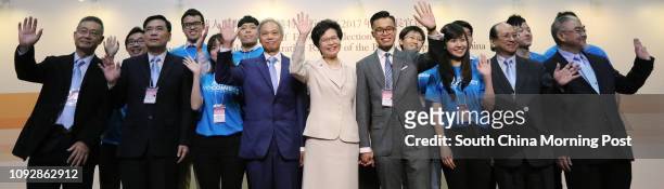 Carrie Lam Cheng Yuet-ngor , her husband Lam Siu-por , her son Jeremy Lam Tsit -sze and supporters poses for a picture after Carrie Lam wins the Hong...
