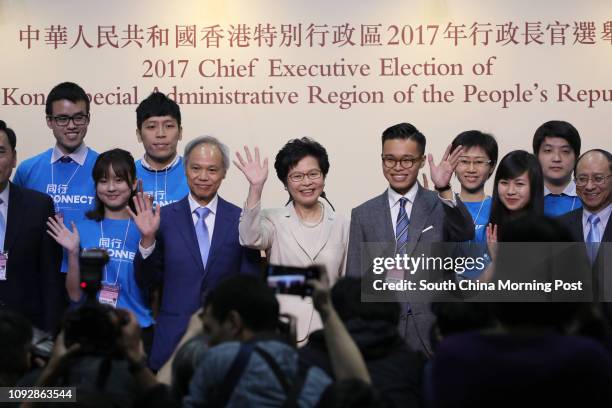 Carrie Lam Cheng Yuet-ngor accompanied by her husband Lam Siu-por and son Jeremy Lam Tsit-sze meets media after she won the Chief Executive election...