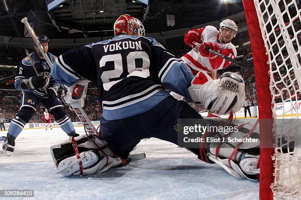 Pavel Datsyuk of the Detroit Red Wings shoots and scores against Goaltender Tomas Vokoun of the Florida Panthers at the BankAtlantic Center on...