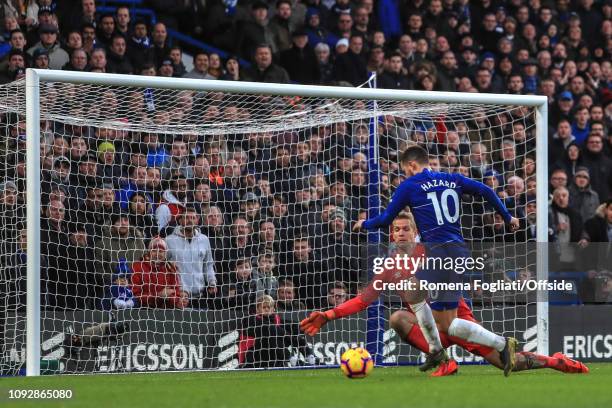Eden Hazard of Chelsea scores their third goal during the Premier League match between Chelsea FC and Huddersfield Town at Stamford Bridge on...