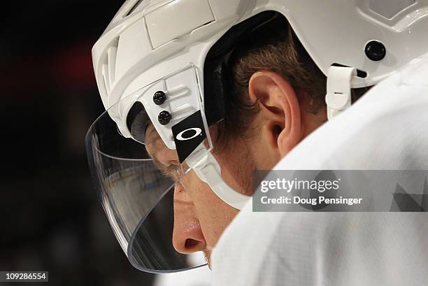 Nick Johnson of the Pittsburgh Penguins looks through the visor of his helmet during warm ups prior to facing the Colorado Avalanche at the Pepsi...