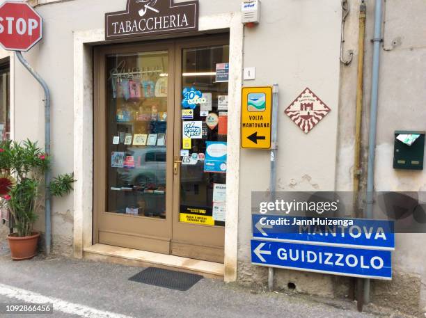 cavriana, mantua province, italy: tobacconist shop - tobacconists stock pictures, royalty-free photos & images