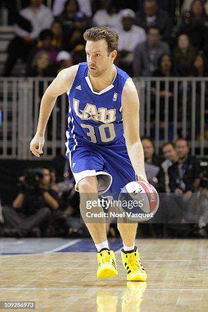 Jason Sudeikis plays at the 2011 BBVA NBA All-Star Celebrity Game at the Los Angeles Convention Center on February 18, 2011 in Los Angeles,...