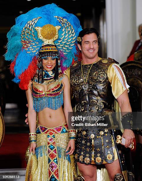 Roman characters Cleopatra and Julius Caesar wait for singer Celine Dion to arrive at Caesars Palace February 16, 2011 in Las Vegas, Nevada. Dion...