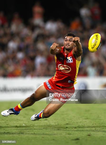 Karmichael Hunt of the Suns dives for the ball during the Pool Five NAB Cup round one AFL match between the Sydney Swans and the Gold Coast Suns at...