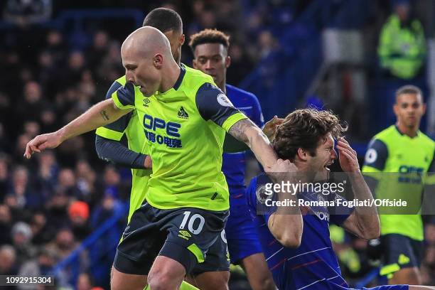 Marcos Alonso of Chelsea reacts after challenge with Aaron Mooy of Huddersfield Town during the Premier League match between Chelsea FC and...