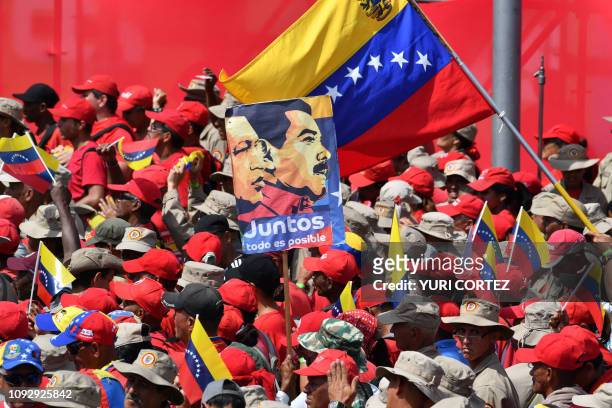 Supporters of Venezuelan President Nicolas Maduro gather to mark the 20th anniversary of the rise of power of the late Hugo Chavez, the leftist...