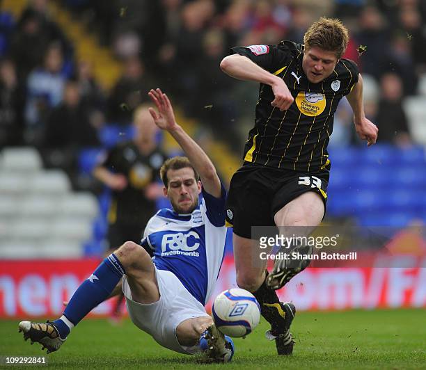 Neil Mellor of Sheffield Wdnesday is tackled by Roger Johnson of Birmingham City during the FA Cup Sponsored by e.on 5th Round match between...
