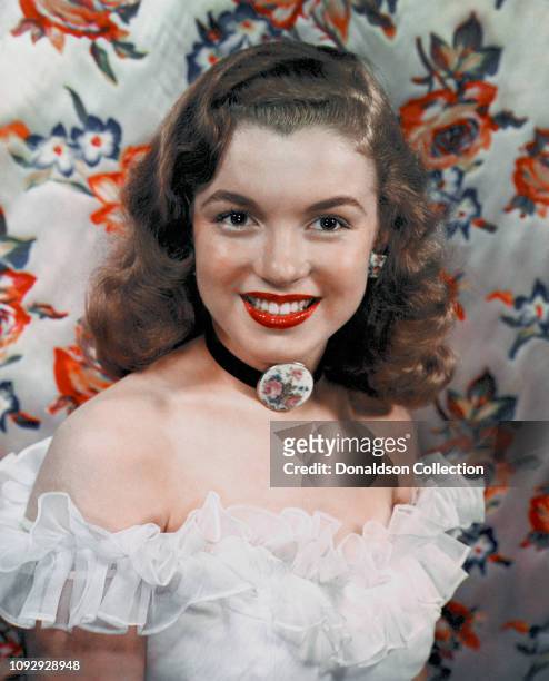 Actress Marilyn Monroe then known as Norma Jeane Mortenson poses for a portrait in 1946 in Los Angeles, California.