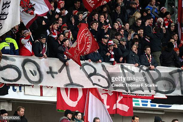 Supporters of Kaiserslautern show a protest banner against the '50+1 Regel' during the Bundesliga match between Hannover 96 and 1. FC Kaiserslautern...