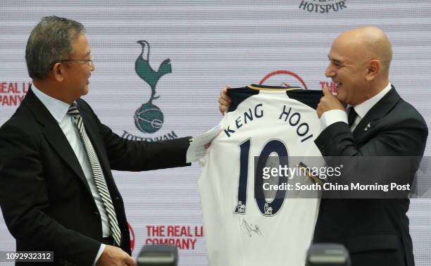 Ng Keng Hooi, Group Chief Executive & President Designate, AIA and Daniel Levy, Chairman, Tottenham Hotspur FC sign a Spur shirt; AIA and Tottenham...