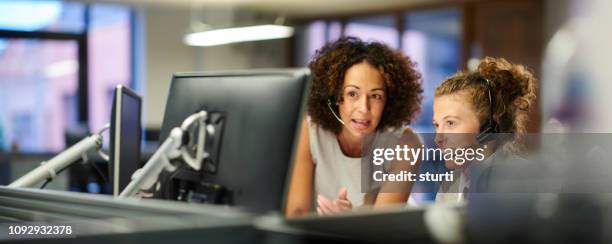 call centre trainee - apprentice office imagens e fotografias de stock