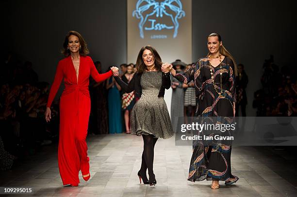 Andrea Dellal, designer Daniella Helayel and Yasmin Le Bon walk the runway at the Issa London show during London Fashion Week Autumn/Winter 2011 at...