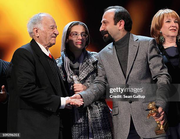 Actor Ali-Asghar Shahbazi receives the Silver Bear for Best Actor, director Asghar Farhadi receives the Golden Bear for Best Movie at the Award...