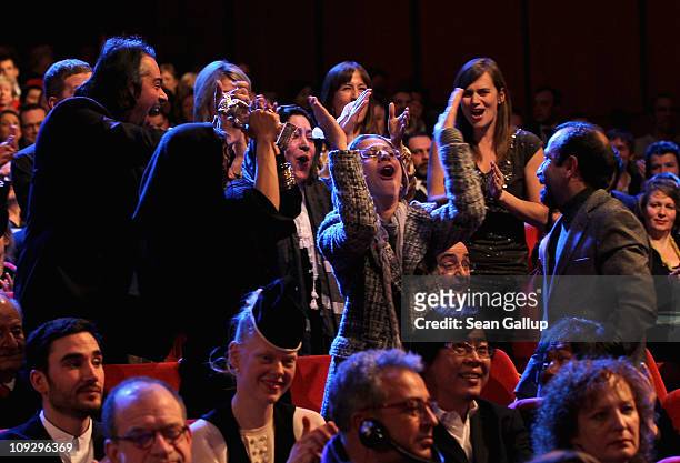 Iranian director Asghar Farhadi is celebrated by his cast for winning the Golden Bear for Best Movie at the Award Ceremony during day ten of the 61st...
