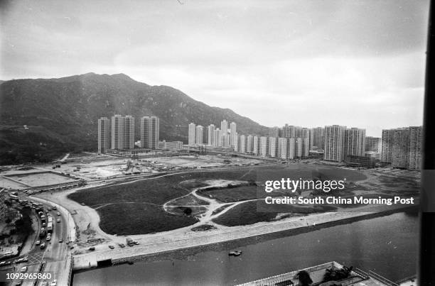 Tuen Mun, flanked by mountains, is still a virtual building site at the moment -- but there are plans for parks and a marina. 23DEC82