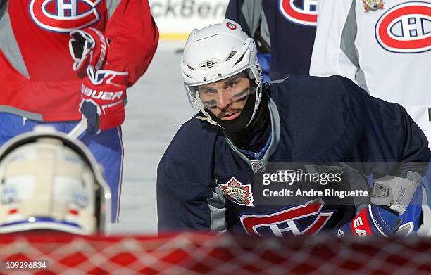 Brian Gionta of the Montreal Canadiens skates during the practice session the day before the 2011 NHL Heritage Classic at McMahon Stadium on February...