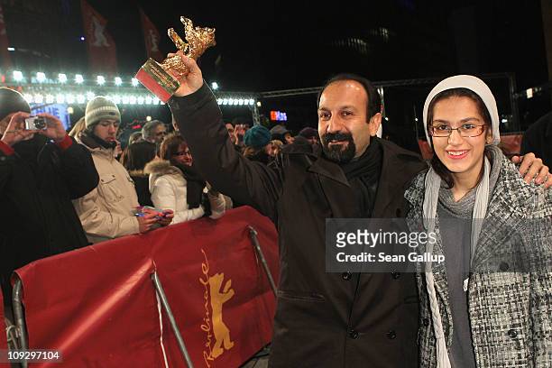 Director Asghar Farhadi of Iranian movie 'Jodaeiye Nader Az Simin' with the Golden Bear for Best Movie and his daughter Sarina Farhadi during day ten...