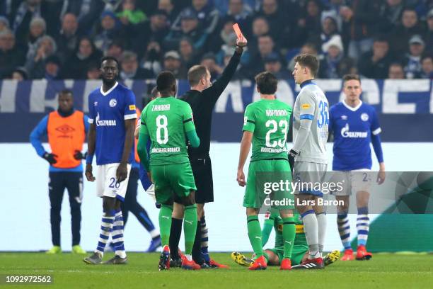 Alexander Nueebel of FC Schalke 04 is shown a red card by referee Alexander Nubel during the Bundesliga match between FC Schalke 04 and Borussia...