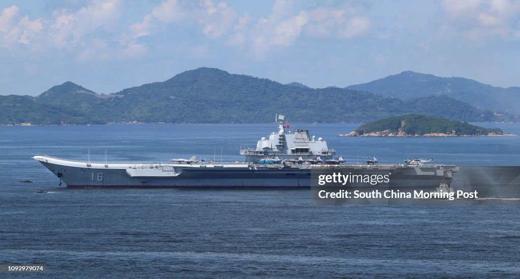 Chinese Navy Ship (CNS) Type 001 aircraft carrier Liaoning departs from Hong Kong waters on Tuesday morning July 11, 2017. 11JUL17 SCMP / Roy Issa
