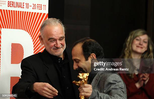 Hungarian director Bela Tarr, who won the Jury Grand Prix Silver Bear for the film The Turin Horse and Iranian director Asghar Farhadi, who won the...