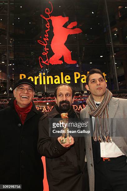 Director Asghar Farhadi of Iranian movie 'Jodaeiye Nader Az Simin' with the Golden Bear for Best Movie with Iranian actor Peyman Moadi and during day...