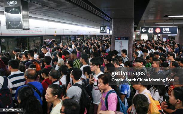 Tsuen Wan line service delay causes long queues at Prince Edward Station. 28JUL17 SCMP / Sam Tsang