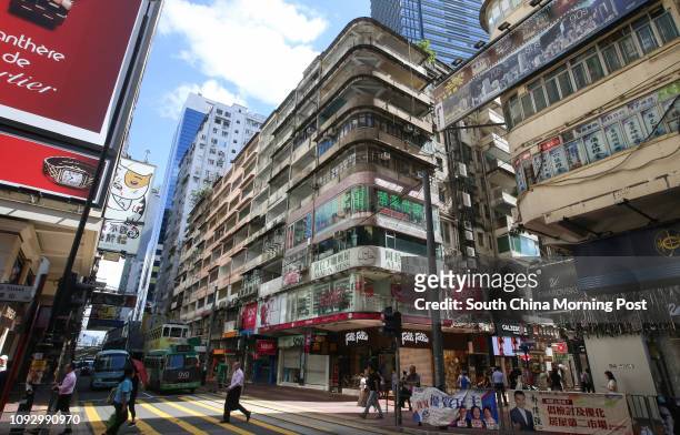 General photo of empty units of three connected tenement buildings on 45 - 76 Percival Street in Causeway Bay. Ground floor shops are still open for...