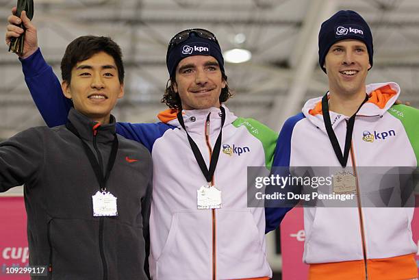 Seung-Hoon Lee of Korea in second place, Bob de Jong of The Netherlands in first place and Bob de Vries of The Netherlands in third place, take the...