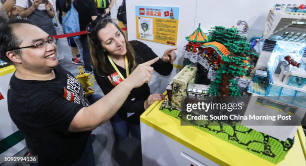 Vincent Cheung 1st place winner and Lego designer Melody Louise Caddick at the LEGO Award Presentation Ceremony at the Hong Kong Convention and...