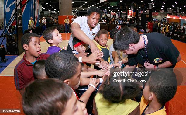 Head coach Jennifer Gillom of the Los Angeles Sparks gives encouragement to participants during a WNBA Fit Clinic at Jam Session presented by Adidas...