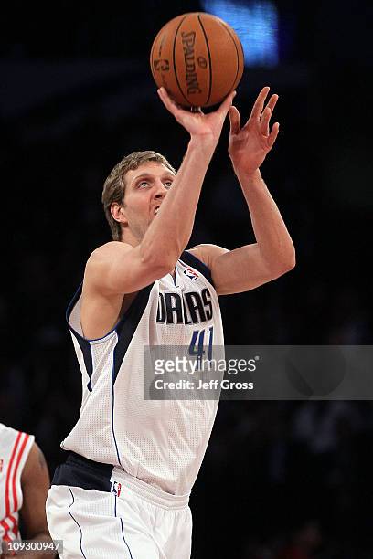 Dirk Nowitzki of the Dallas Mavericks and playing for Team Texas competes in the Haier Shooting Stars Competition apart of NBA All-Star Saturday...