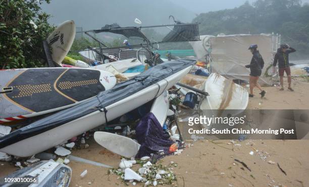 Boats, canoes and water craft are destroyed by the strong waves that hit Shek O beach as Typhoon Hato hits Hong Kong on August 23, 2017 with signal...