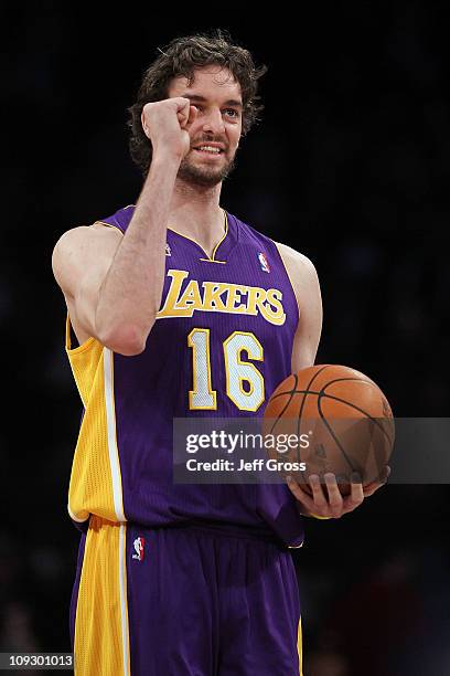 Pau Gasol of the Los Angeles Lakers and playing for Team Los Angeles reacts as he competes in the Haier Shooting Stars Competition apart of NBA...