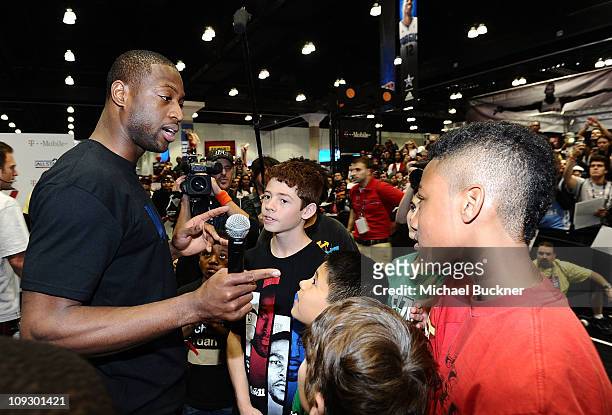 Miami Heat Point Guard Dwyane Wade greets fans at T-Mobile: NBA on 4G Interactive Space at Jam Session during NBA All-Star 2011 on February 19, 2011...