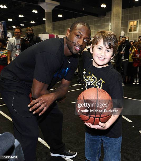 Miami Heat Point Guard Dwyane Wade greets fans at T-Mobile: NBA on 4G Interactive Space at Jam Session during NBA All-Star 2011 on February 19, 2011...