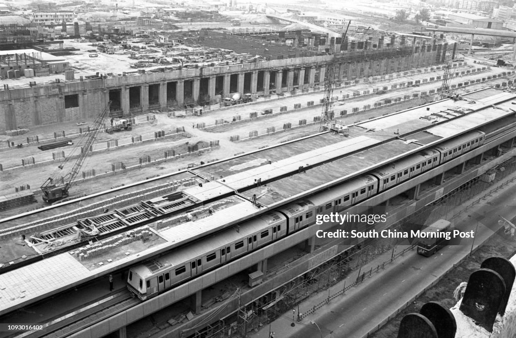 A Mass Transit Railway train on a trial run between the overhead stations of Kowloon Bay and Choi Hung. 04SEP78
