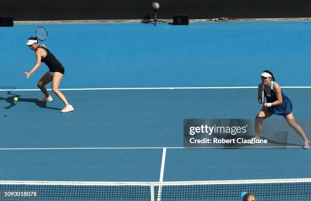 Hao-Ching Chan and Latisha Chan of Taipei and Kirsten Flipkens of Belgium and Johanna Larsson of Sweden compete in the doubles final during day eight...