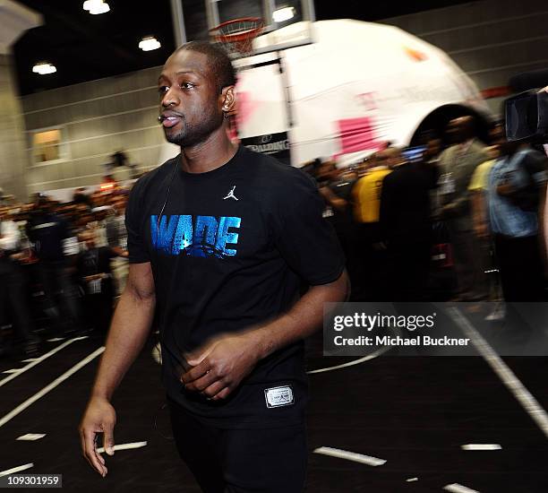 Miami Heat Point Guard Dwyane Wade greets fans at T-Mobile: NBA on 4G Interactive Space at Jam Session during NBA All-Star 2011 on February 19, 2011...