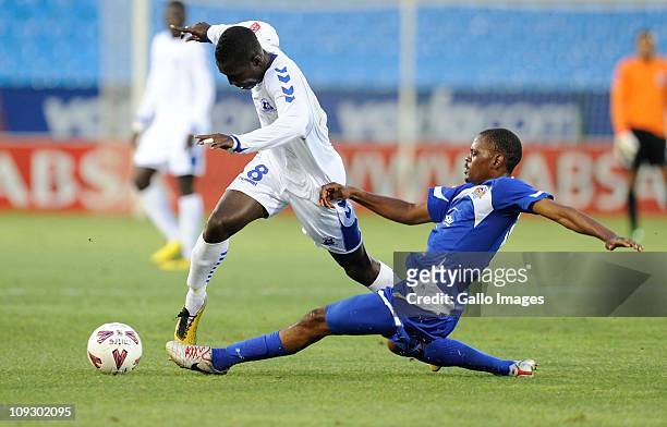 John Arwuah and Mogogi Gabonamong compete for the ball during the Absa Premiership match between SuperSport United and Maritzburg United at Loftus...