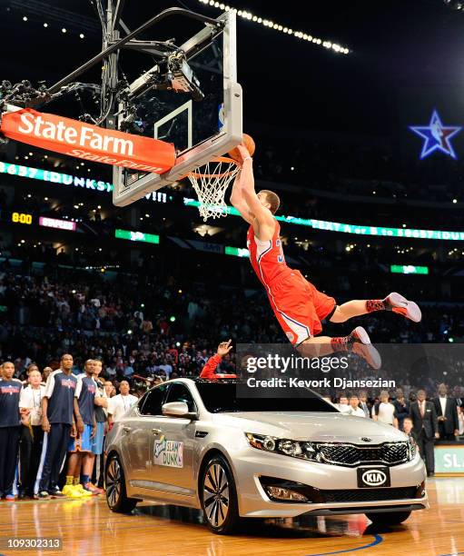 Blake Griffin of the Los Angeles Clippers dunks the ball over a car in the final round of the Sprite Slam Dunk Contest apart of NBA All-Star Saturday...