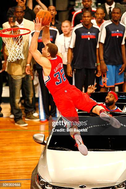 Blake Griffin of the Los Angeles Clippers dunks over a KIA during the Sprite Slam Dunk Contest during 2011 All-Star Saturday Night presented by State...