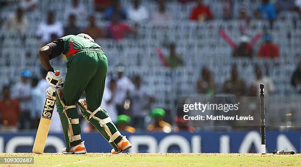 Steve Tikolo of Kenya looks on, after he was bowled by Hamish Bennett of New Zealand during the 2011 ICC World Cup Group A match between Kenya and...