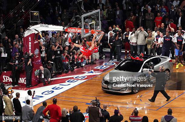 Blake Griffin of the Los Angeles Clippers dunks the ball over a car in the final round of the Sprite Slam Dunk Contest apart of NBA All-Star Saturday...