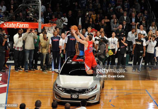 Blake Griffin of the Los Angeles Clippers dunks over a KIA during the Sprite Slam Dunk Contest during 2011 All-Star Saturday Night presented by State...