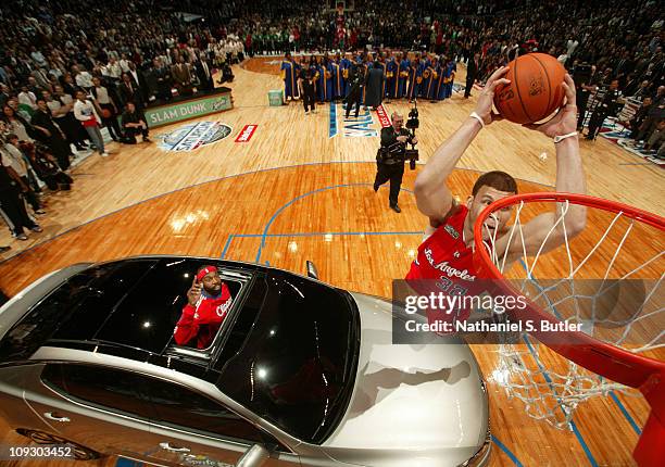 Blake Griffin of the Los Angeles Clippers attempts a dunk during the 2011 Sprite Slam Dunk Contest at Staples Center on February 19, 2011 in Los...