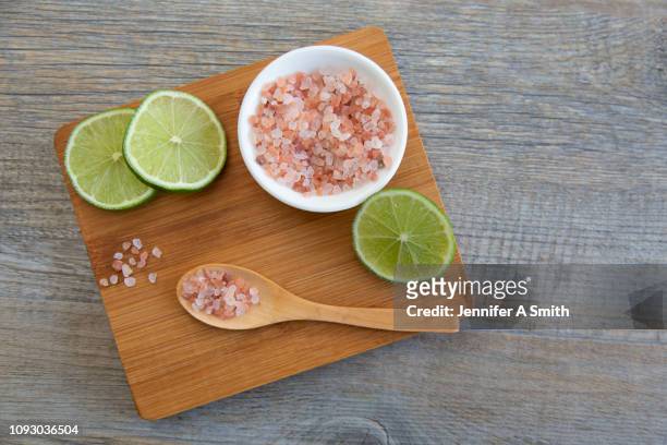lime and salt - himalayan salt stock-fotos und bilder