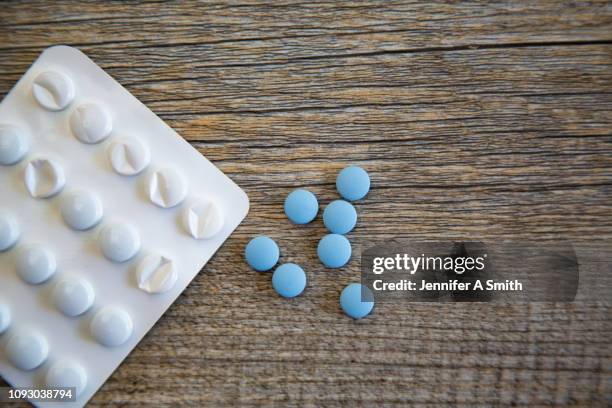 the little blue pills - viagra stock pictures, royalty-free photos & images