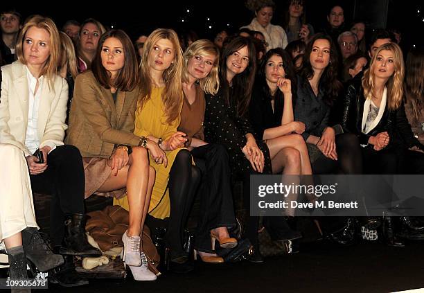 Kate Reardon, Olivia Palermo, Clemence Posey, Kirsten Dunst, Leith Clark, Gemma Arterton, Rebecca Hall, and Rosamund Pike sit in the front row at the...